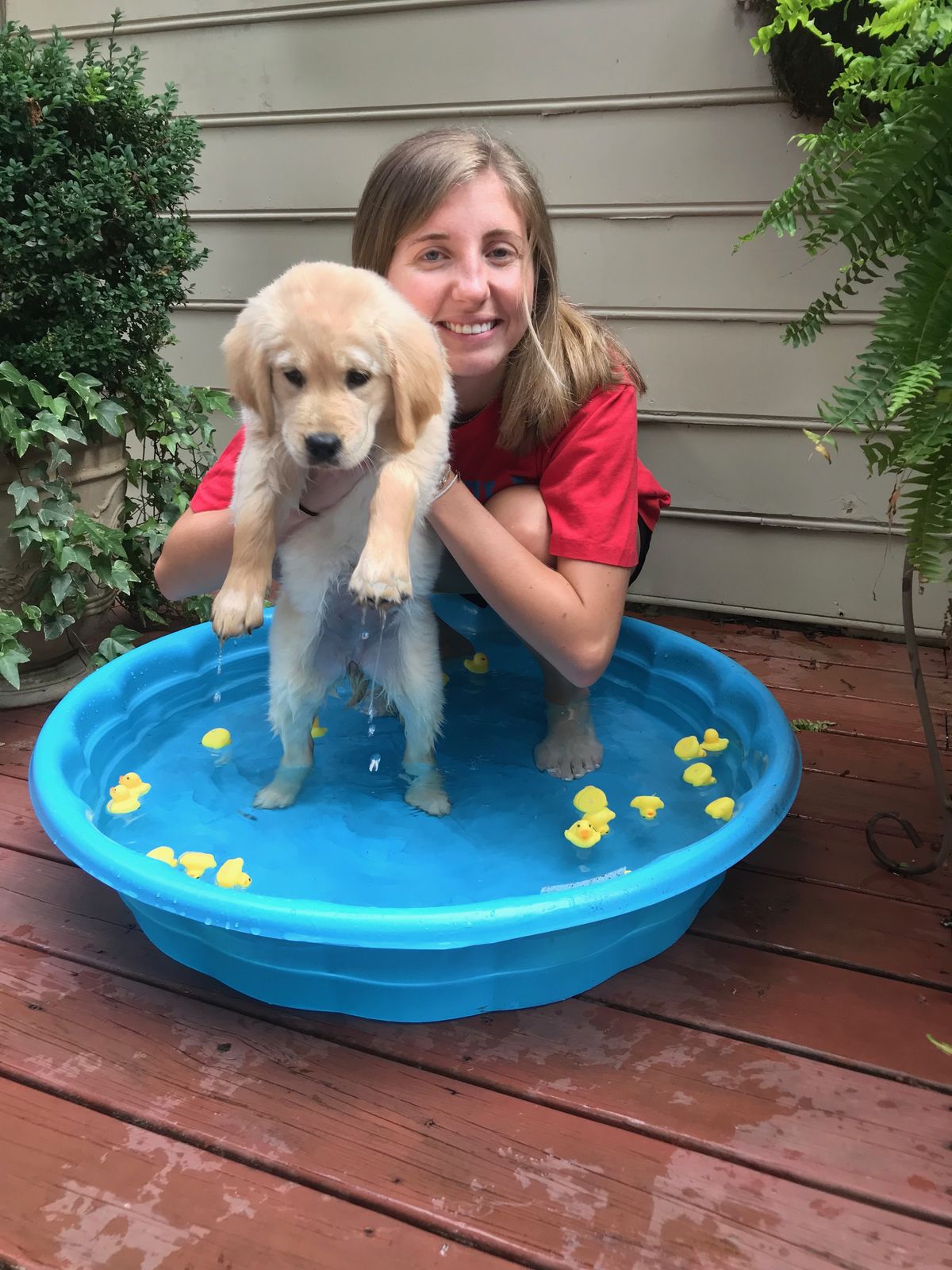 Laura with her Golden Retriever puppy